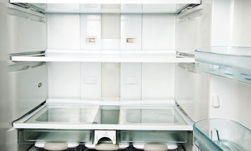 The inside of a refrigerator showing the various plastics that light-curable adhesives can bond together.
