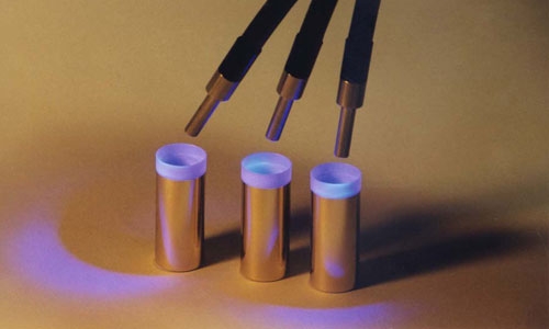 Bonding dissimilar substrates together with a trifurcated lightguide.