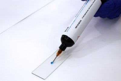 1181-M MD® Medical Coating dispensing onto plastic slide